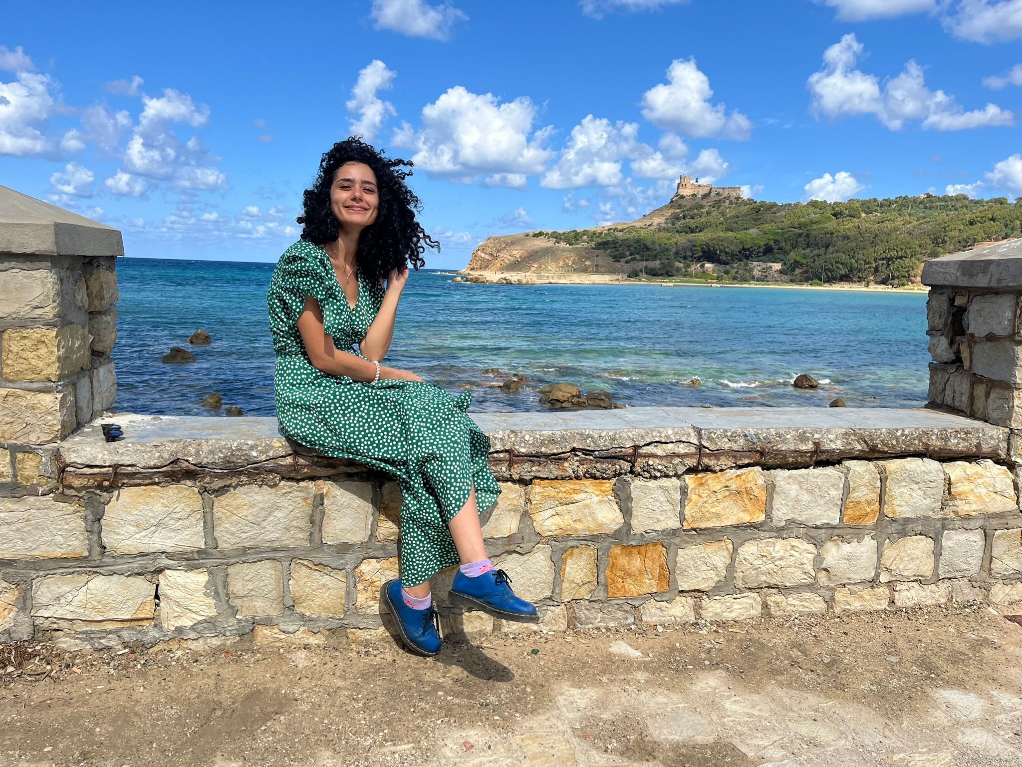 green polkadot dress by the sea
